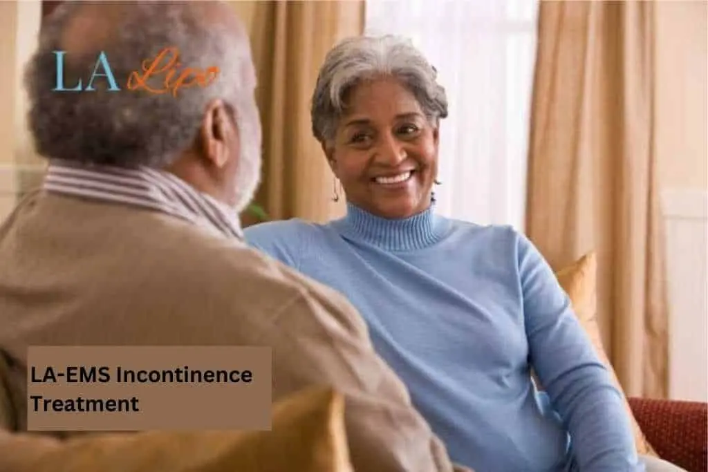 Couple sat smiling at each other - LA-EMS treatment Walton-on-Thames