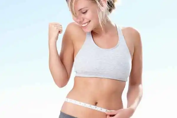 woman happy after fat reduction treatment Walton-on-Thames