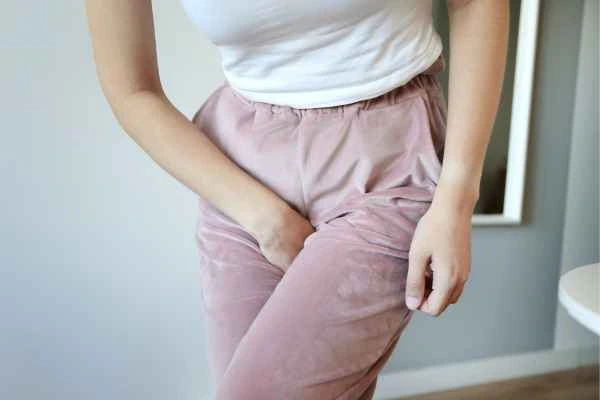 woman struggling with urine incontinence Walton-on-Thames
