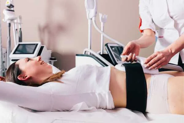 woman having body sculpting to help improve her body image and her mental health Walton-on-Thames